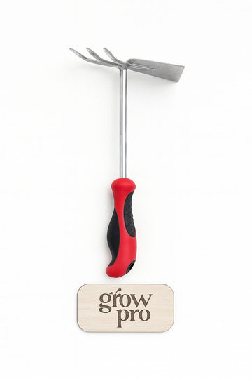 Dual-head gardening tool with stainless steel cultivator and hoe, featuring a red and black ergonomic handle, displayed on a white background with engraved wooden Grow Pro logo plaque.”