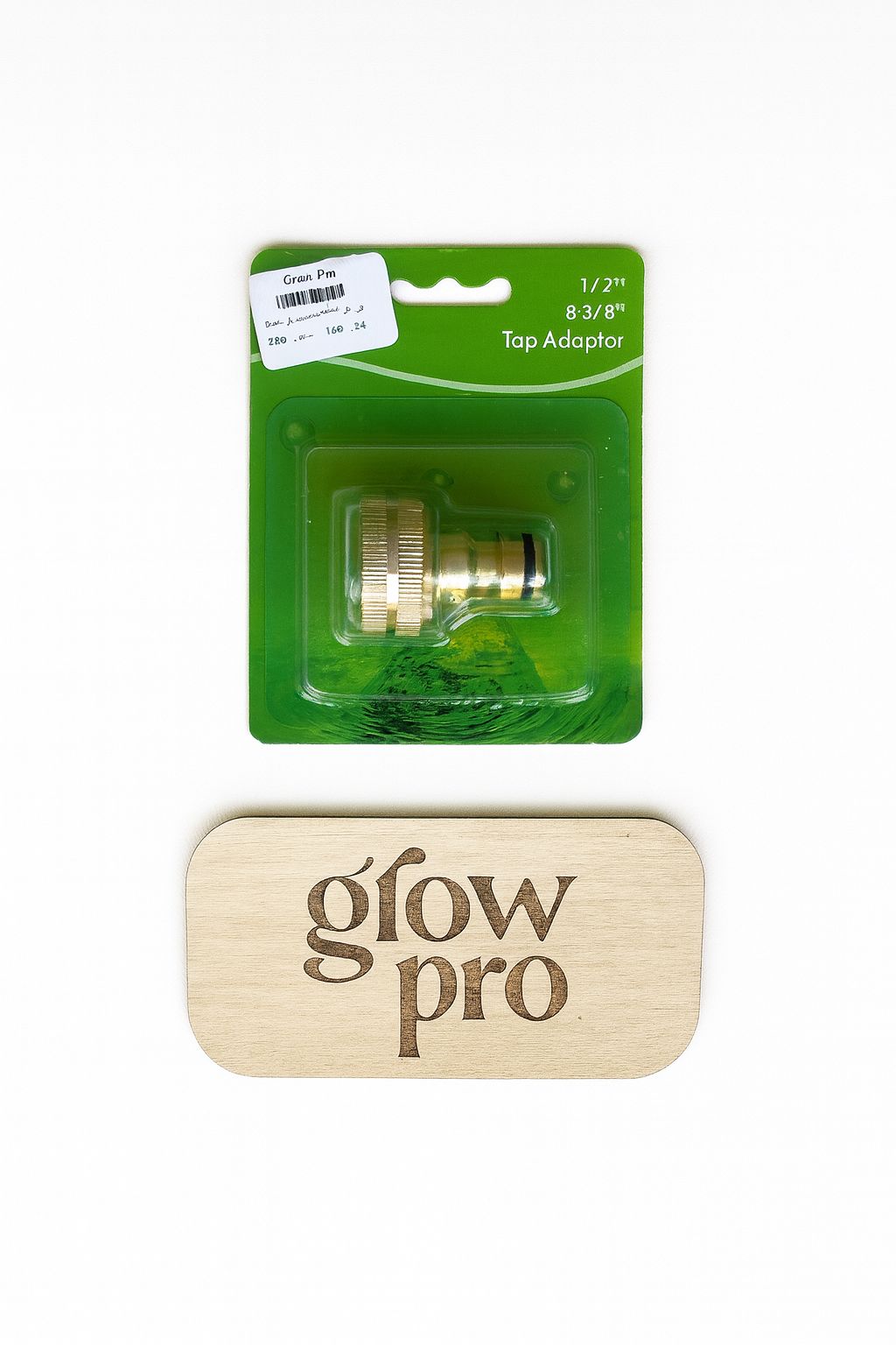 Brass tap adaptor in retail packaging, compatible with 1/2” and 3/4” fittings, displayed on a white background for GrowPro e-commerce listing.