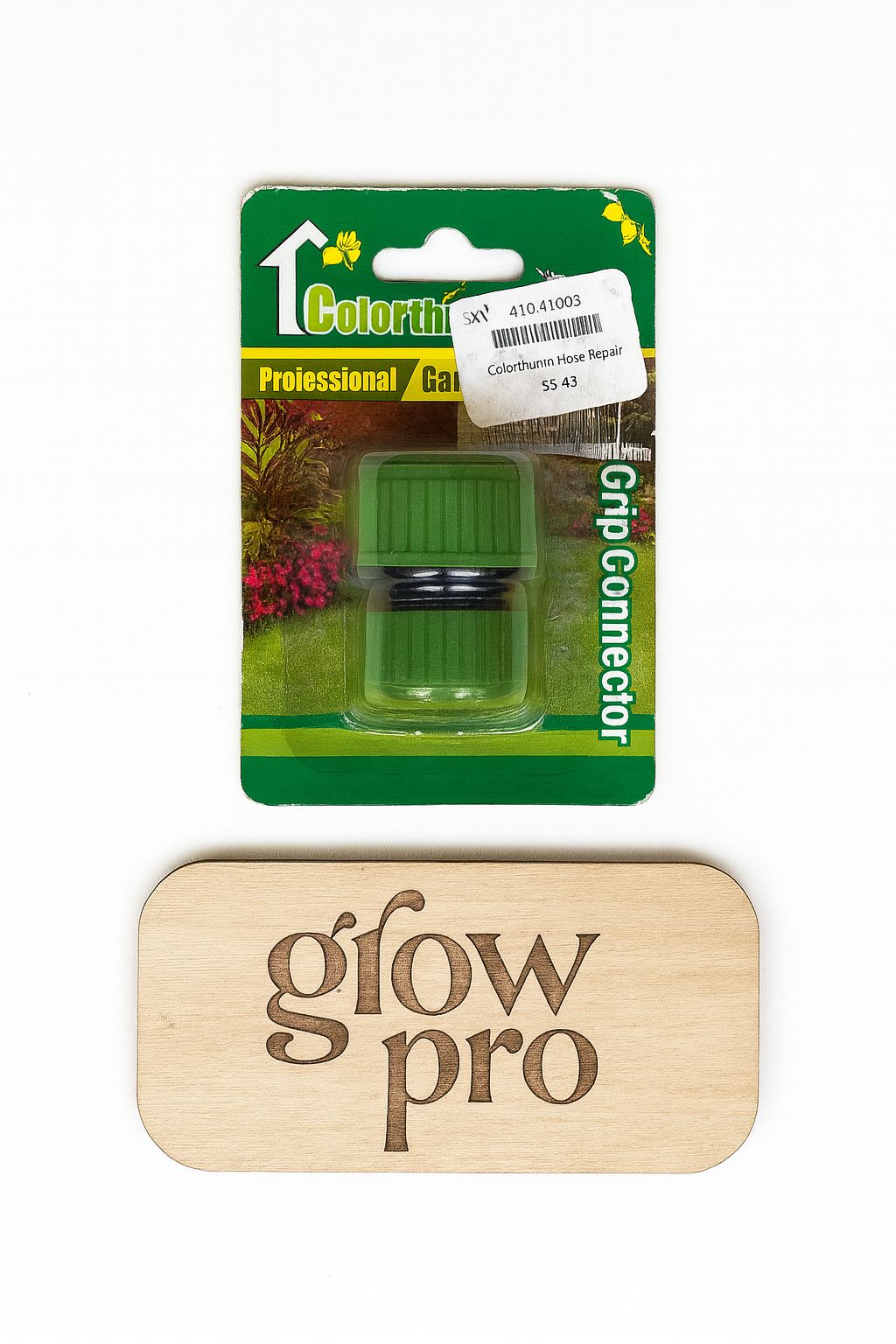 packaged garden hose connectors in various designs and colors, arranged around an engraved wooden Grow Pro logo plaque on a white background.”
